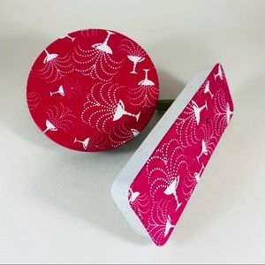 Two vintage tin New Years Eve deep pink cocktail print noise makers.